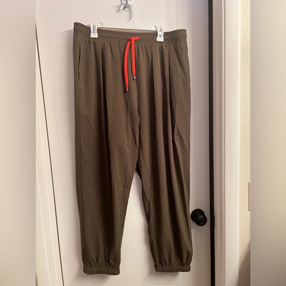 Olive Harem type pants. No tags but never worn. Orange drawstring. Size 3XL.